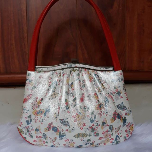 Túi xách tay da thật