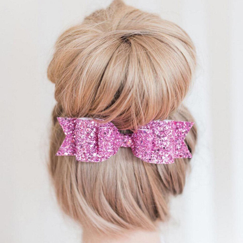 Cột nơ kim tuyến đáng yêu.