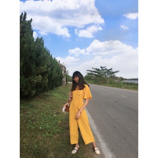 Đầm vàng thắt nơ