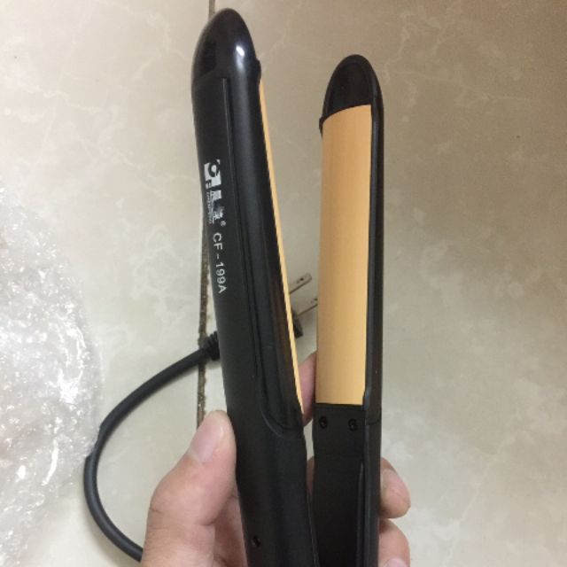 Máy là cụp