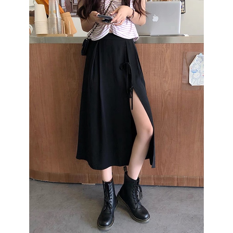 Chân váy nữ xẻ tà có dây buộc nơ ngay eo, chân váy midi qua gối cá tính Okélla