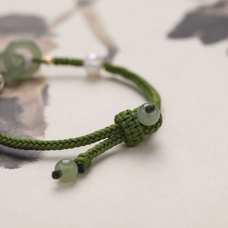 Vòng tay charm đài sen ngọc định mệnh