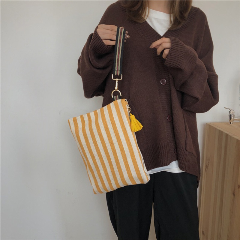 Túi Đựng Mỹ Phẩm Vải Canvas Kẻ Sọc Phối Núm Tua Thời Trang Cho Nữ