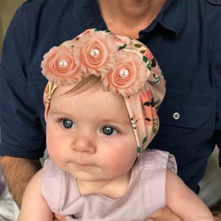 Băng đô turban đính hoa và hạt ngọc trai co giãn dễ thương cho bé gái