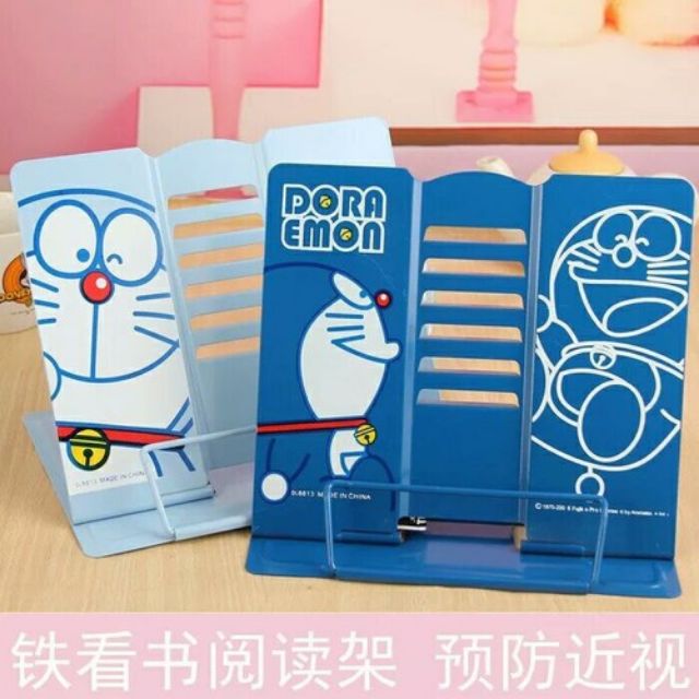 Giá kẹp sách chống cận thị hình hello kitty, doremon cho bé