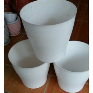 - chậu trồng hoa rộng 25cm cao 25cm (không có lỗ thoát nước) hàng cty, loại 1.