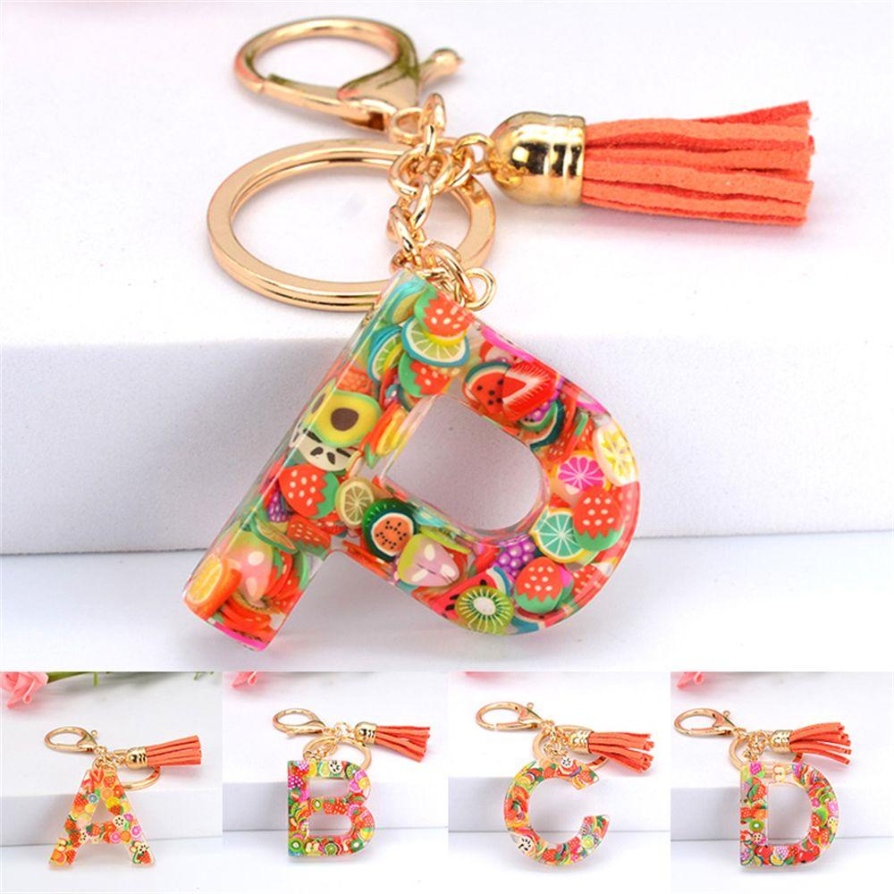 Móc Khóa Hình 26 Chữ Cái Gắn Lát Trái Cây Màu Sáng Phối Tua Rua Thời Trang Cho Nữ