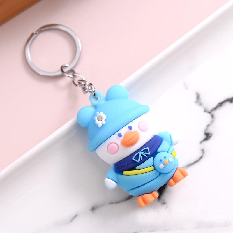 Móc Khóa Hoạt Hình Chú Vịt Đội Mũ Hoa Cute.