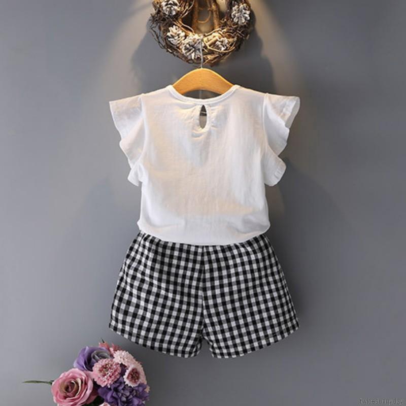 Set áo thun hoạt hình + chân váy cho bé gái