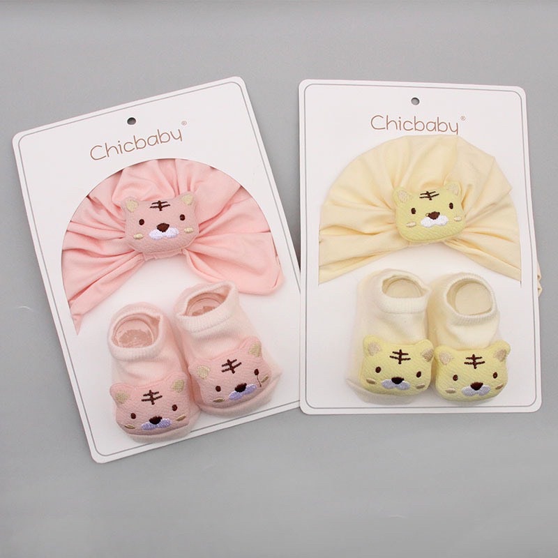 Set mũ turban kèm tất 3D chống trượt cho bé gái 6-12 tháng