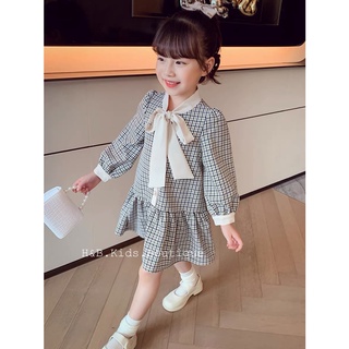 Váy kẻ cổ nơ đuôi cá bé gái