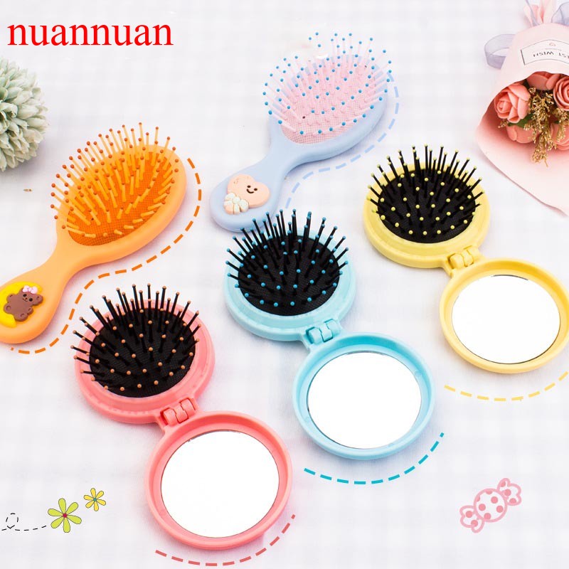 Lược nhựa chải tóc mát xa da đầu có gương trang điểm tiện lợi
