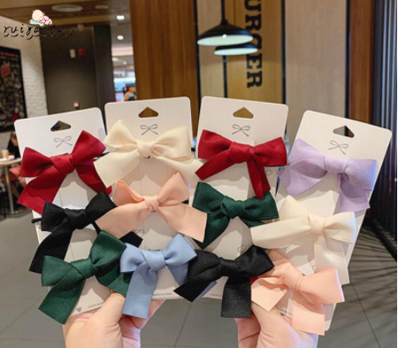 Dây buộc tóc vải satin hình nơ xinh xắn cho nữ