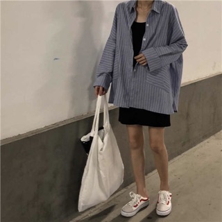 Sơmi dáng thụng xanh