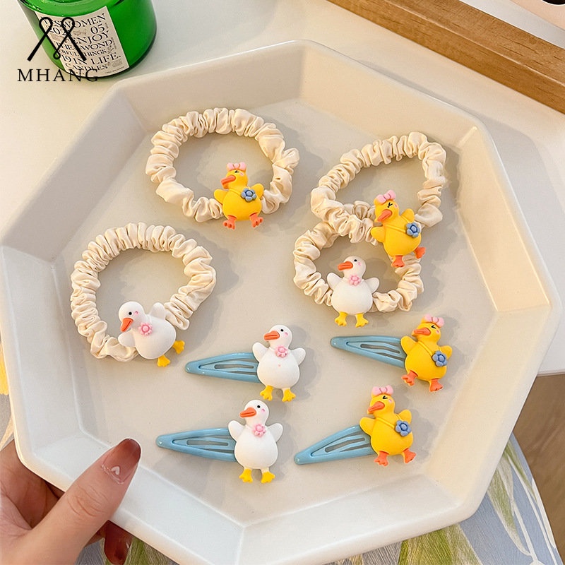 Bộ 2 Dây Cột Tóc Hình Vịt Vàng Hoạt Hình Dễ Thương Cho Bé Gái