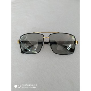 kính mát đổi màu Prada 5004 của Italy mắt polarized