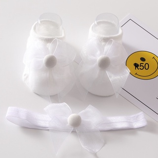 set băng đô và vớ dễ thương cho bé sơ sinh