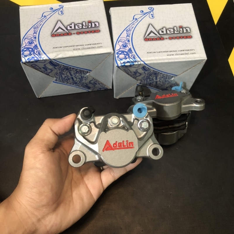 Heo dầu Adelin 2 pis chính hãng logo đỏ dùng cả thắng trước và sau gắn mọi loại xe