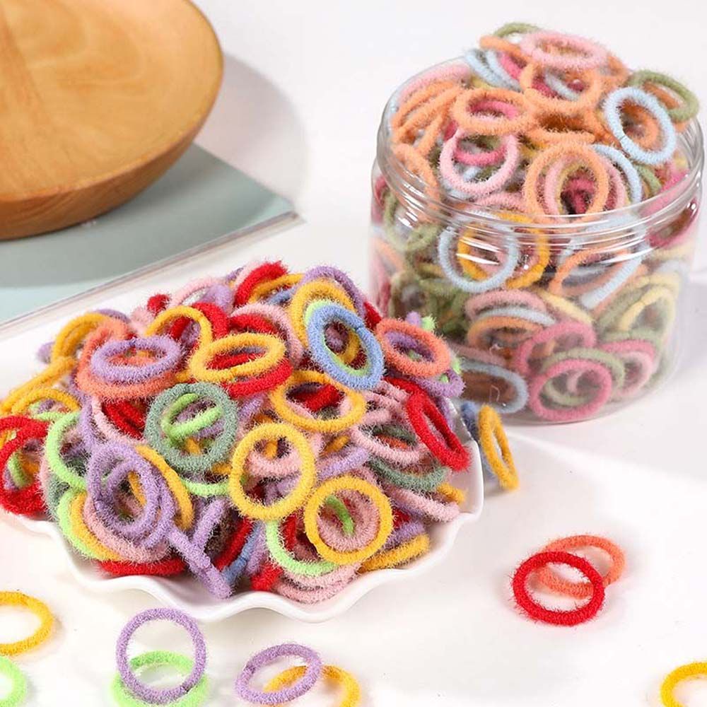 Set 100 dây buộc tóc co giãn bọc vải bông nhiều màu sắc dễ thương cho bé gái