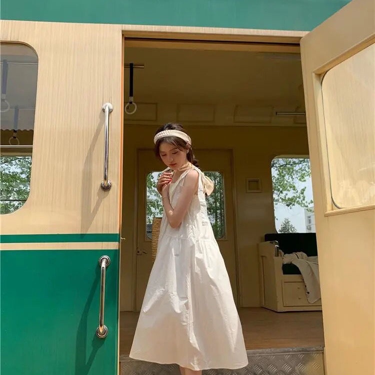 Đầm Hai Dây Mùa Hè 2022 Thắt Nơ Eo Nhỏ Dài Ngang Gối Màu Trắng Cho Nữ