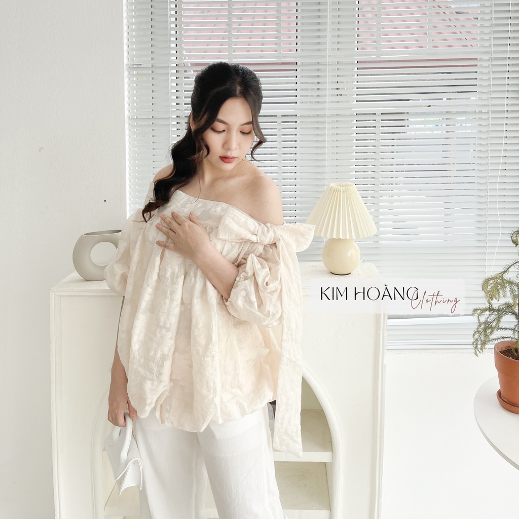 [Mã SKAMFSW175 giảm 10K đơn 50K] Áo gấm lệch vai thêu hoa buộc nơ Kim Hoàng Clothing | BigBuy360 - bigbuy360.vn