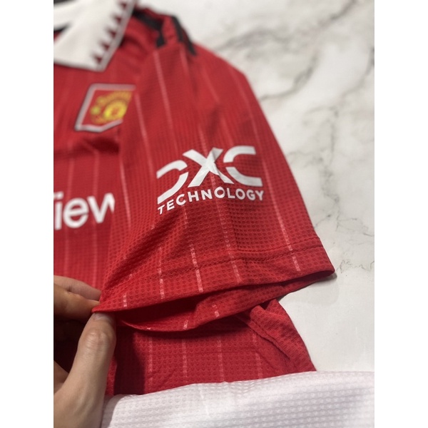 Set bộ quần áo thể thao nam nữ bóng đá clb mu manchester united áo đỏ quần trắng vải gai thái logo thêu đầy đủ