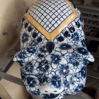 Lợn tiết kiệm vẽ bách hoa