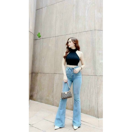 Áo cổ lọ hở lưng đính cườm sau cổ