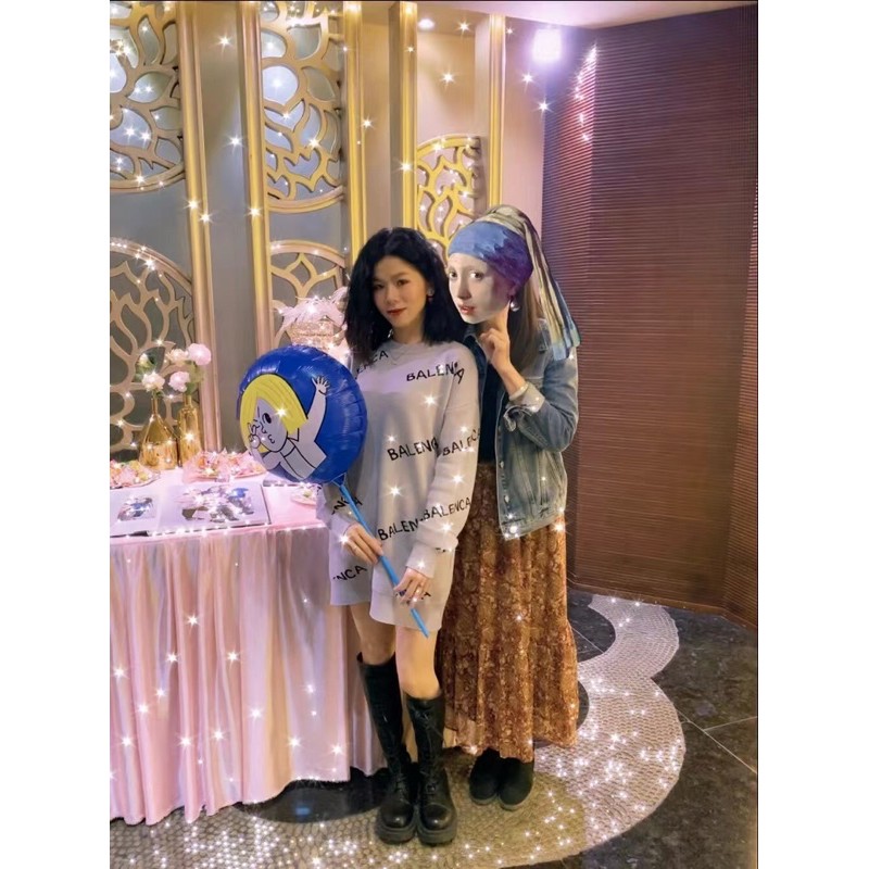 Áo len dáng giấu quần Ba.len.ga