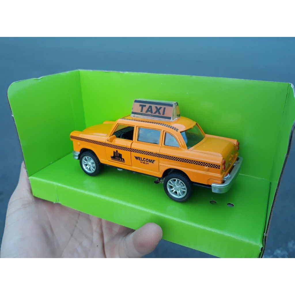 Xe ô tô taxi đồ chơi trẻ em có đèn và âm thanh xe chạy cót mô hình tỉ lệ 1:36