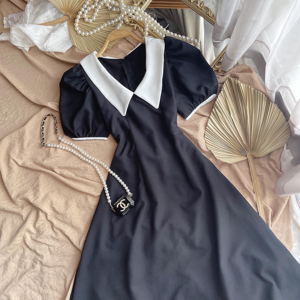 ĐẦM MIDI ĐEN TAY BỒNG CỒ NHỌN TRẮNG | BigBuy360 - bigbuy360.vn