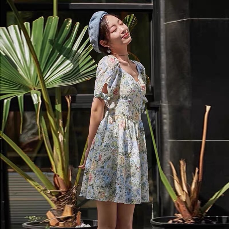 Đầm thêu hoa xanh Peacebird
