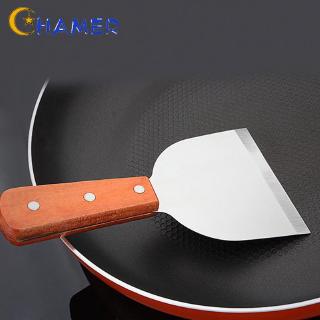 Dụng cụ xẻng chất liệu bằng inox dùng để lật bánh khi nấu ăn