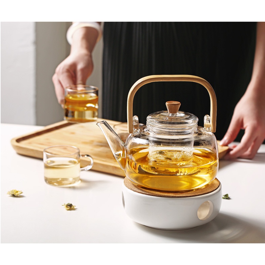 Bộ ấm trà thủy tinh chịu nhiệt có đế đun bằng sứ có bán cốc đi kèm