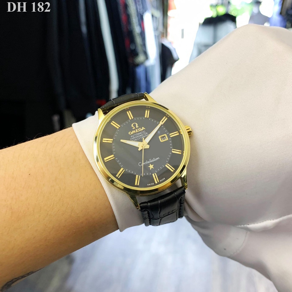 Đồng hồ nam Omega mặt tròn viền mạ vàng sang trọng, dây da cao cấp chống nước DH182 shopmau
