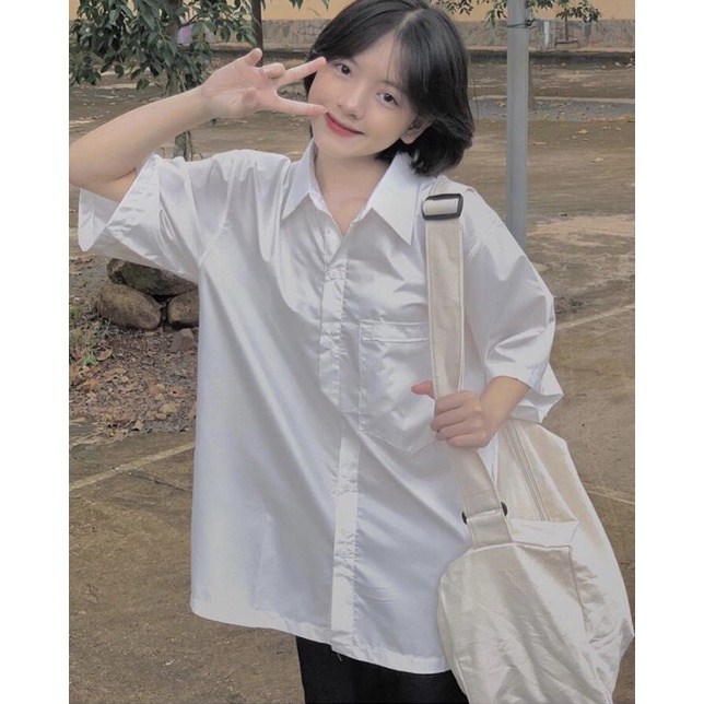 sơ mi trắng tay lỡ túi ngực,đủ size(28-70kg)