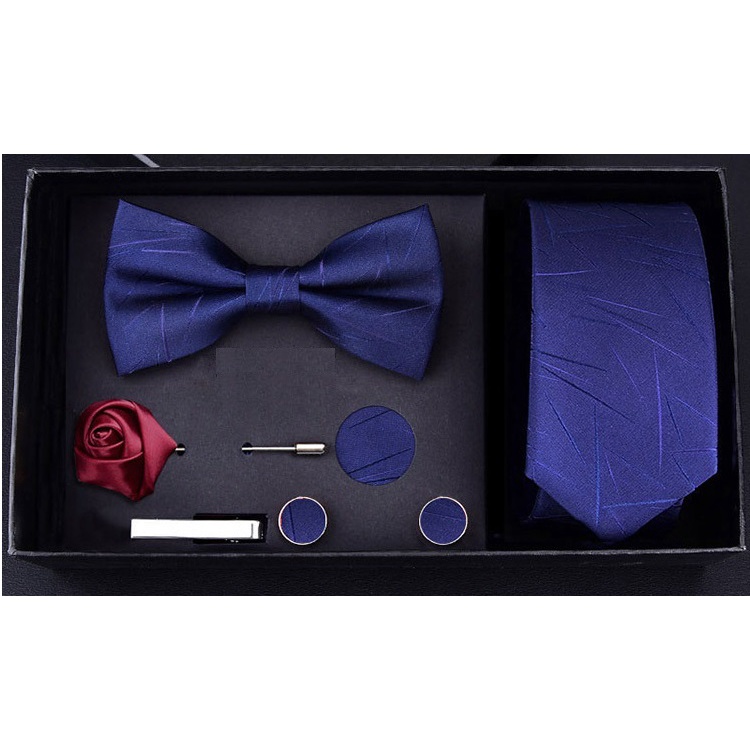 Bộ Cravat 6 món gồm Cavat 6cm màu đen, Nơ cài áo, Khăn cài túi áo, Măng-set, Kẹp cavat, trâm cài áo