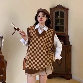 Áo Gile kẻ caro
