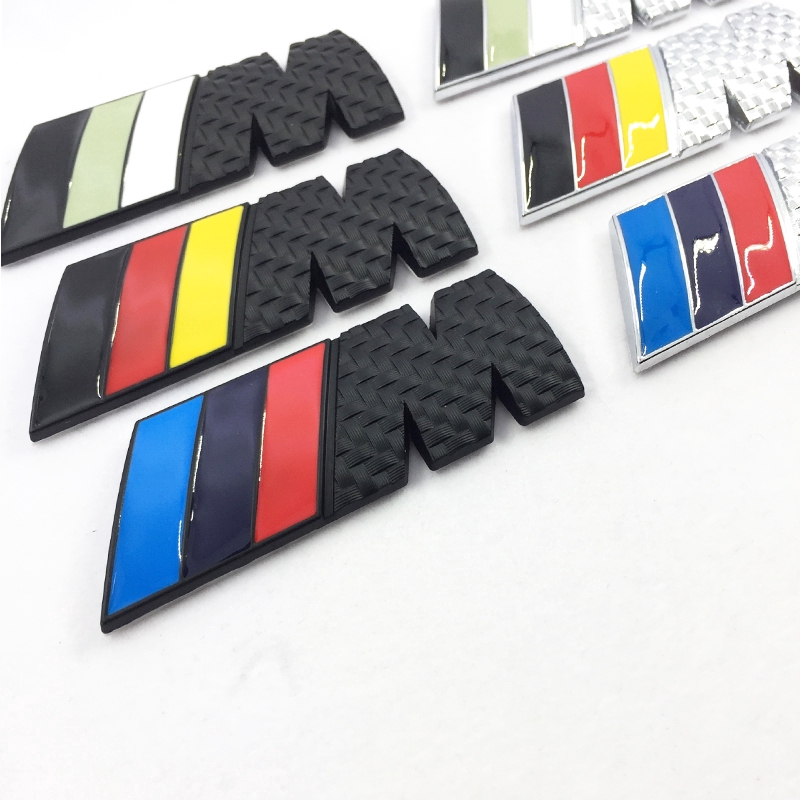 Miếng dán hình logo ///M bằng kim loại mặt sợi carbon dành cho xe hơi BMW