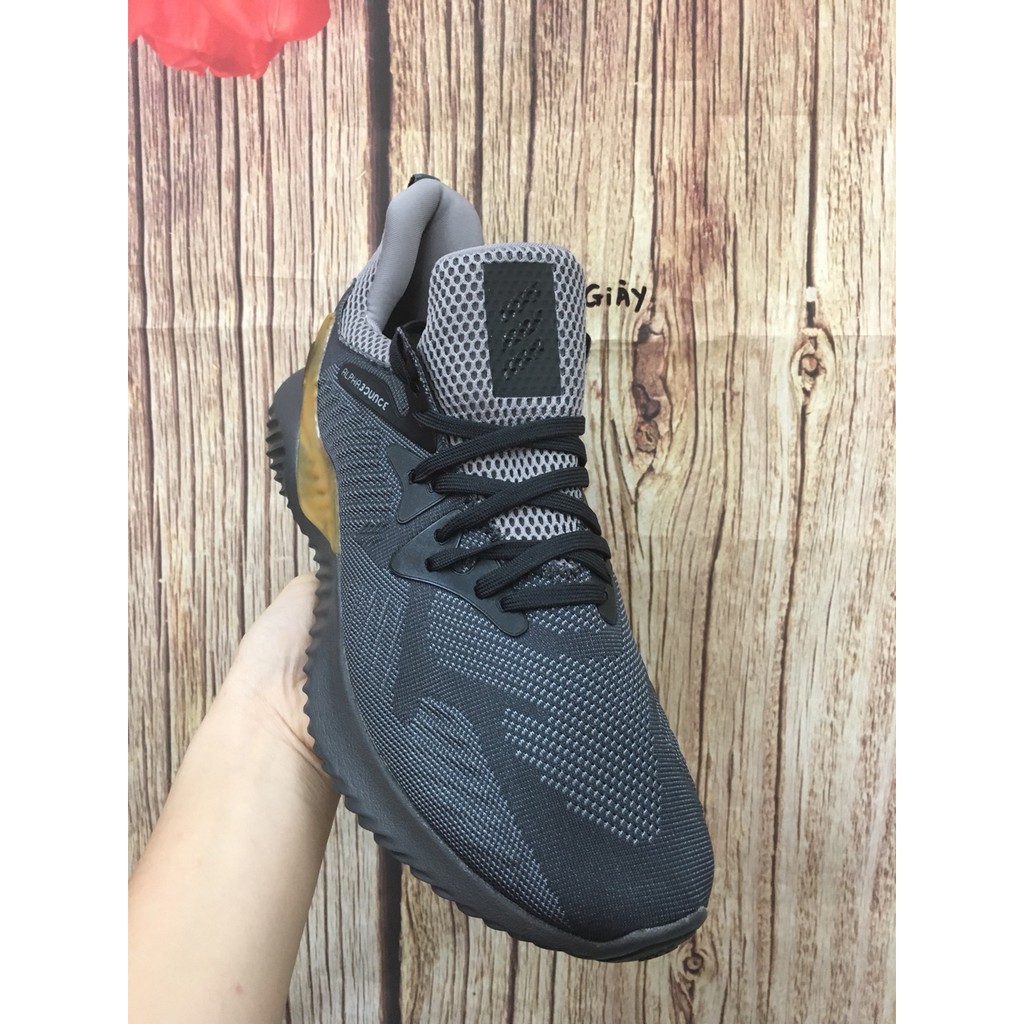 Giày thể thao sneaker Alphabounce xám gót vàng bản trung Hot trend