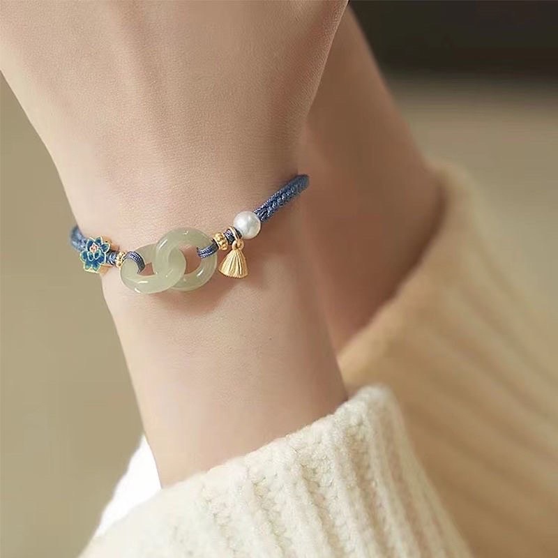 Vòng tay charm đài sen ngọc định mệnh