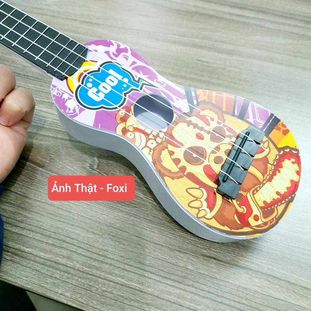 Đồ chơi phát nhạc và nhạc cụ Đàn Guitar Mini-Ukulele cho bé vừa chơi vừa học phát triển trí tuệ