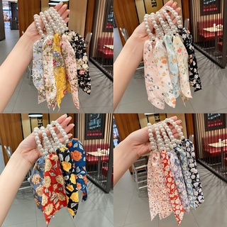1 dây cột tóc hình nơ đính ngọc trai thời trang