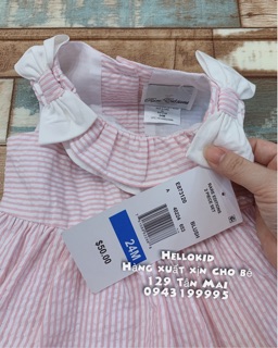 Váy kẻ cổ xoè nơ đục lỗ