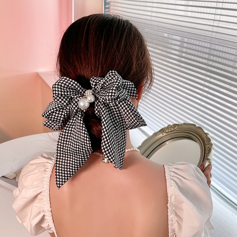 Kẹp tóc hình hơ đính ngọc trai giả xinh xắn cho nữ