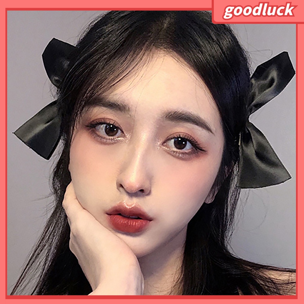 Kẹp tóc hình nơ bướm màu trơn đơn giản dành cho bạn nữ