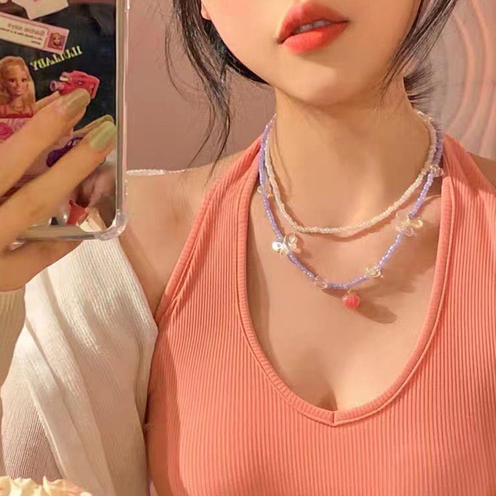 Vòng cổ Mặt Hình Trái Tim Và Bướm Bằng Nhựa Resin Đơn Giản Sáng Tạo Phong Cách Hàn Quốc Cho Nữ