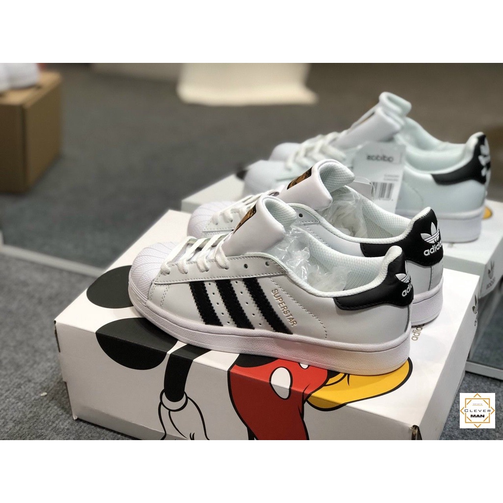 Giày thể thao SUPERSTAR Trắng vạch đen tem vàng, Sò tem Vàng