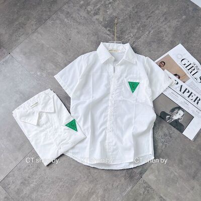 Áo sơ mi nữ trắng cộc tay in túi PRA