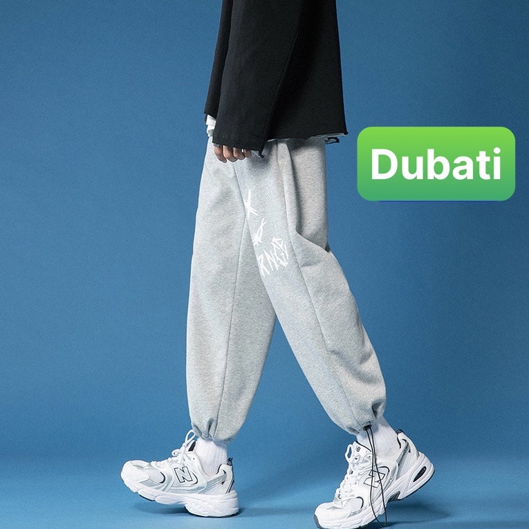 QUẦN JOGGER NAM NỮ UNISEX CHẤT NỈ DÀY DA CÁ ỐNG SUÔNG RỘNG IN HÌNH MẶT CƯỜI PHONG CÁCH SÀNH ĐIỆU NEW - DUBATI FASHION